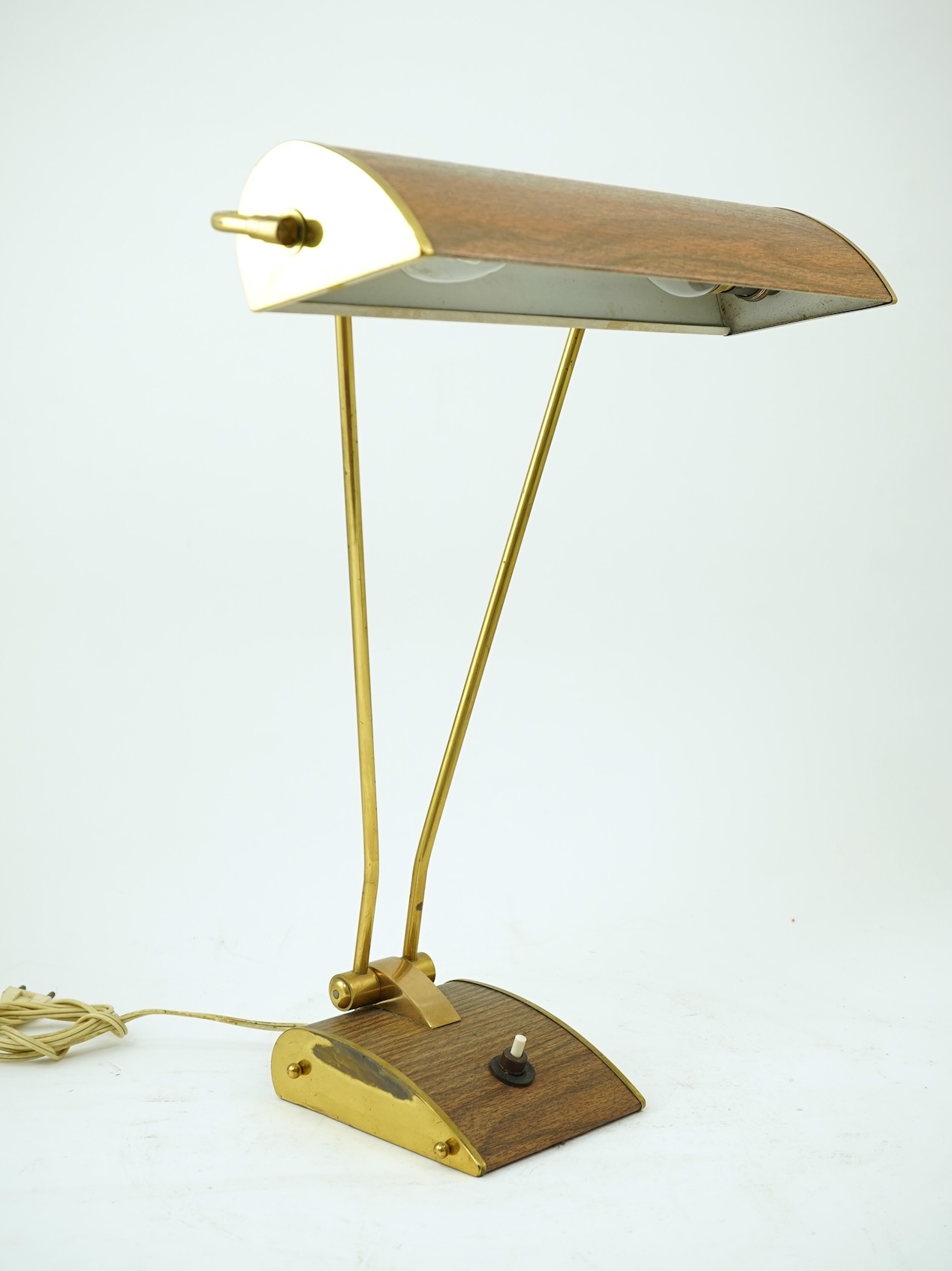 Eileen Gray (Irish, 1878-1976) for Jumo: A brass and wood veneer desk lamp